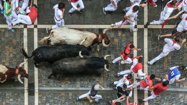 An aerial view of the running of the bulls in Pamplona, Spain